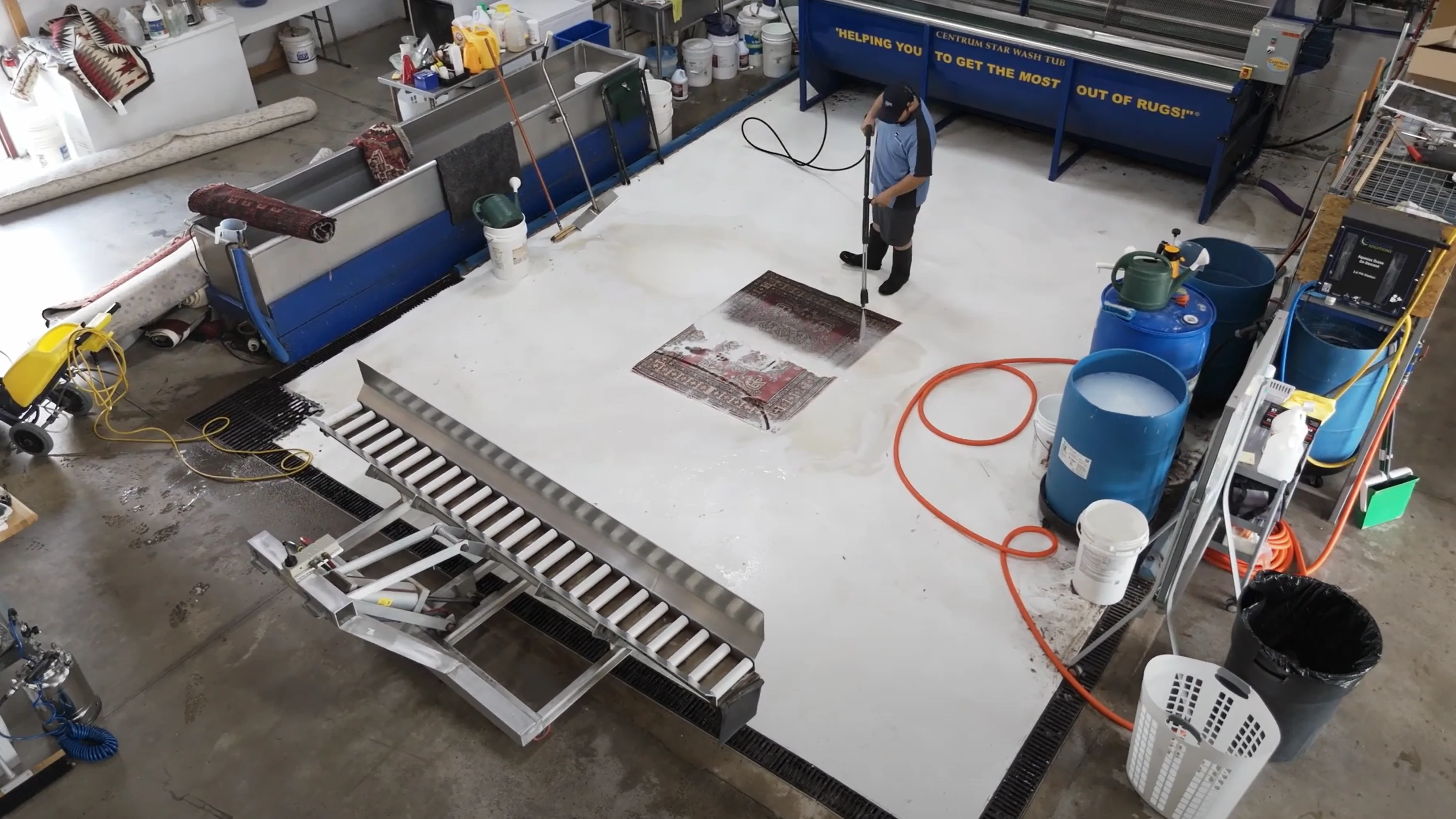 Inside the Rug Life rug washing facility during the cleaning process